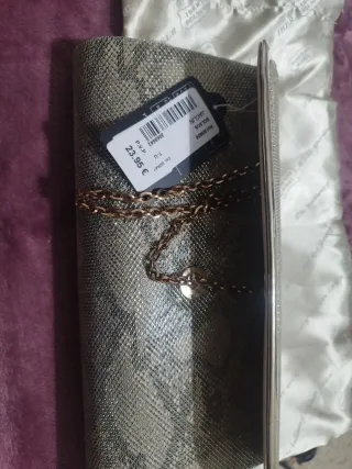 Bolso de mano dorado  brillante