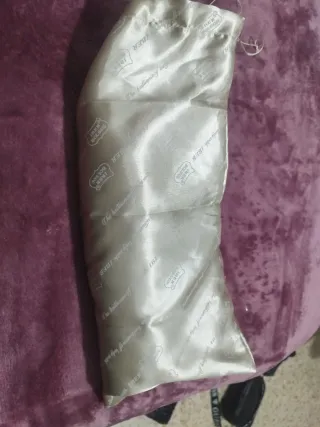 Bolso de mano dorado  brillante