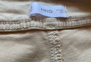 Pantalón largo beige tiro alto