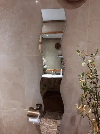 Espejo decorativo ondulado