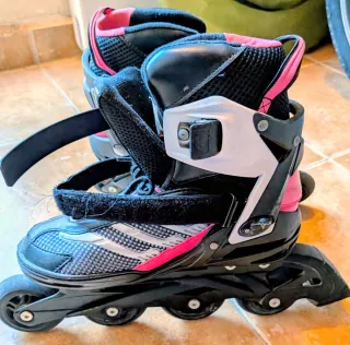 Patines en línea rosas y negros