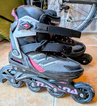 Patines en línea rosas y negros