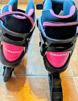 Patines en línea rosas y negros