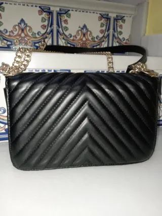 Bolso Saint Laurent Negro y Dorado