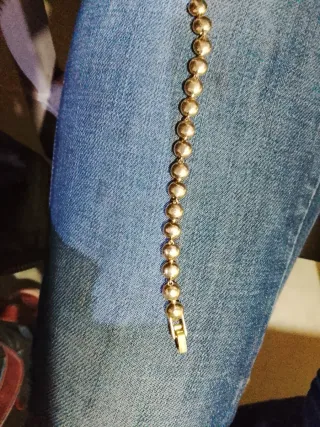 Pulsera Swarovski Circonitas chapado en oro.
