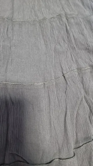 Falda larga marrón.