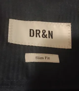 Traje de chaqueta negro de tres piezas con forro a