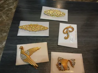 Lote de broches dorados