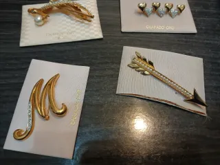 Lote de broches dorados