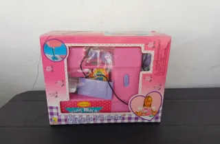 Máquina de coser de juguete vintage