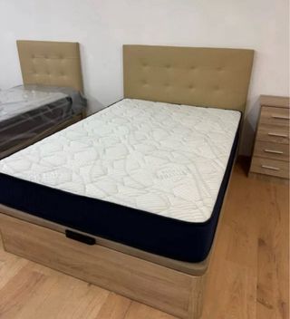 Canapé abatible gris y blanco