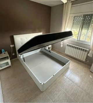 Canapé abatible gris y blanco