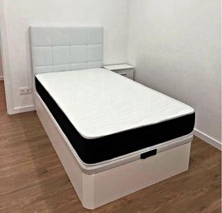 Canapé abatible gris y blanco