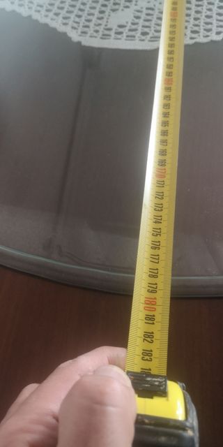 Mesa de comedor ovalada con tapa de cristal