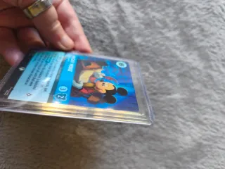 Carta Lorcana Mickey Mouse 219/204 Bob Cratchit