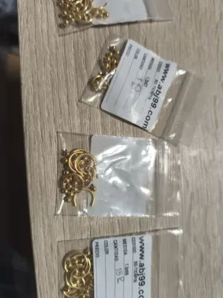 Aros dorados con bolas abj99