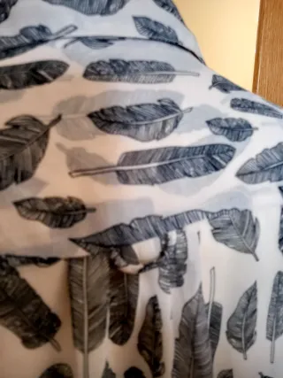 Camisa estampada plumas