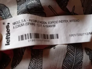 Camisa estampada plumas