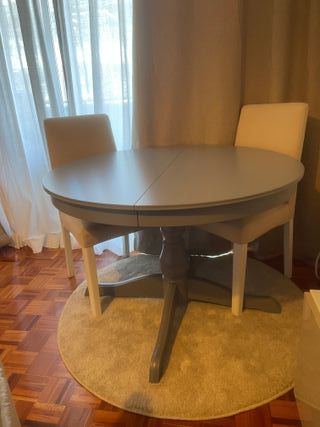 Mesa de comedor ovalada extensible