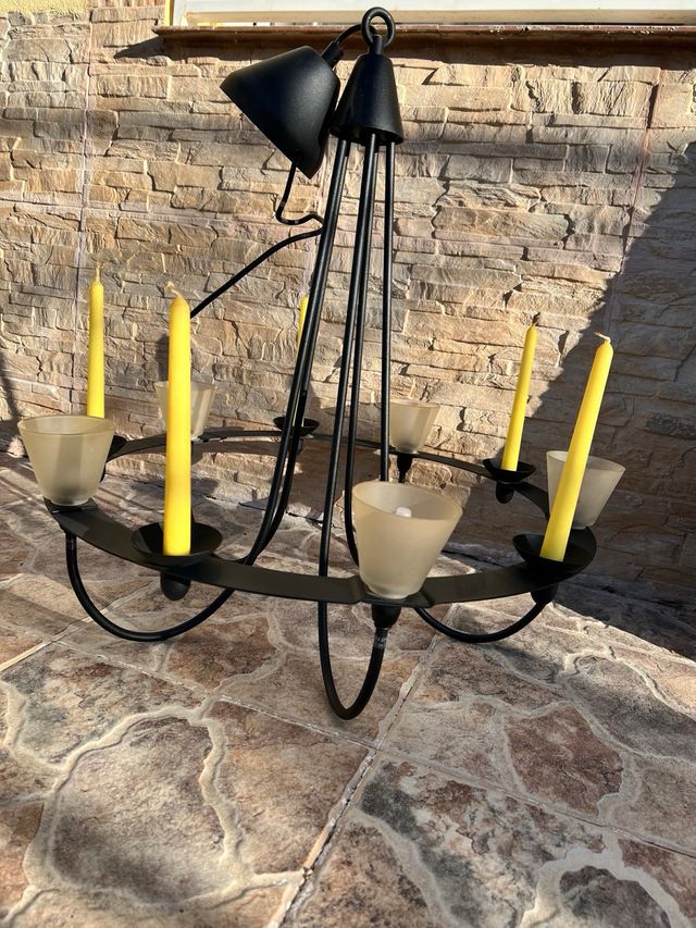Lámpara de forja con velas
