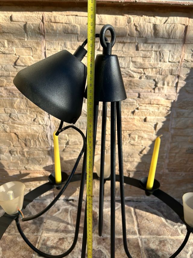 Lámpara de forja con velas