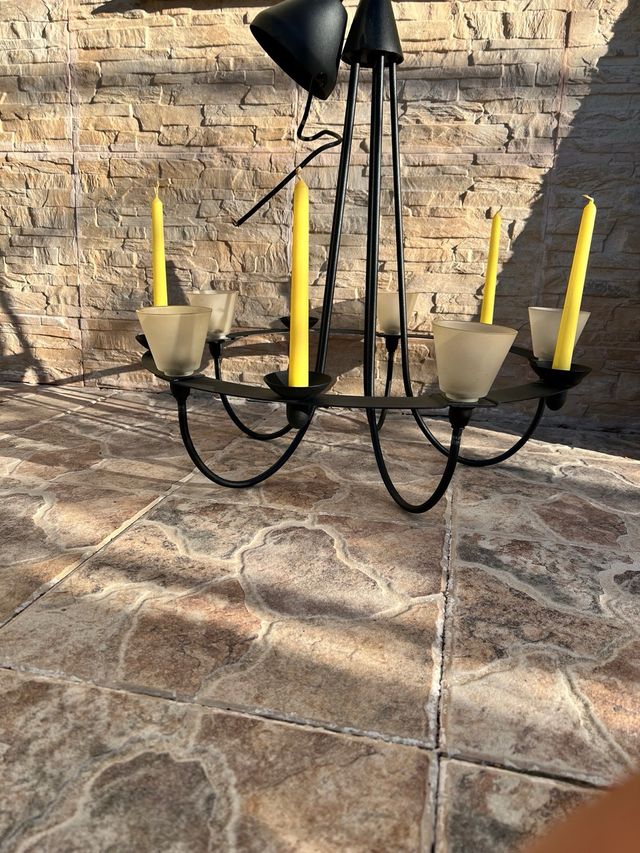 Lámpara de forja con velas