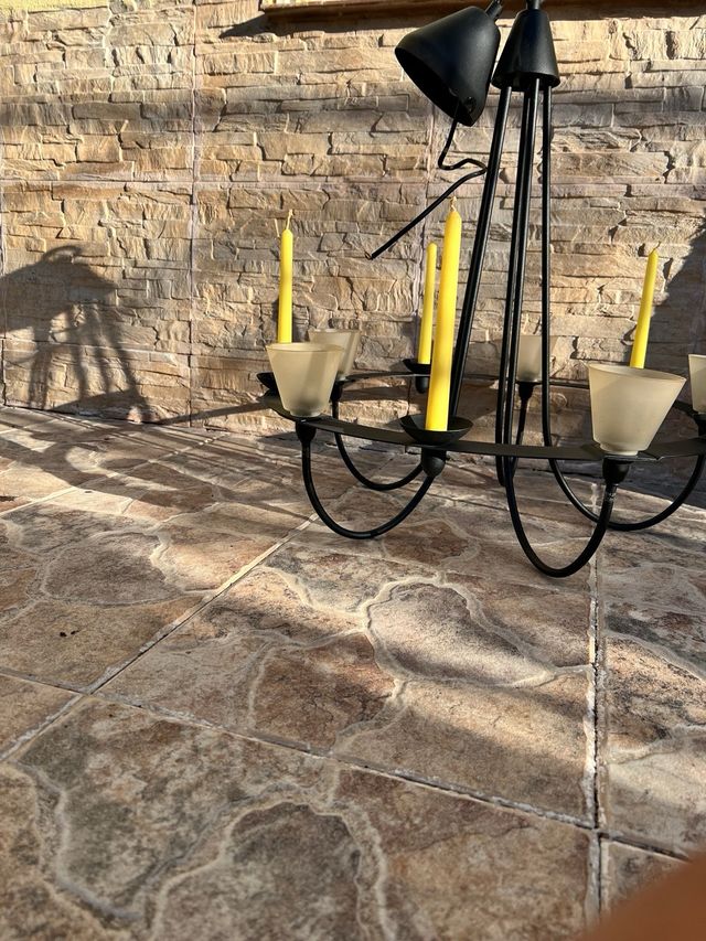 Lámpara de forja con velas