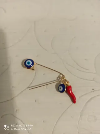 Broche ojo turco y guindilla de la suerte
