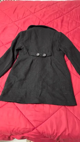 Abrigo paño negro doble botonadura
