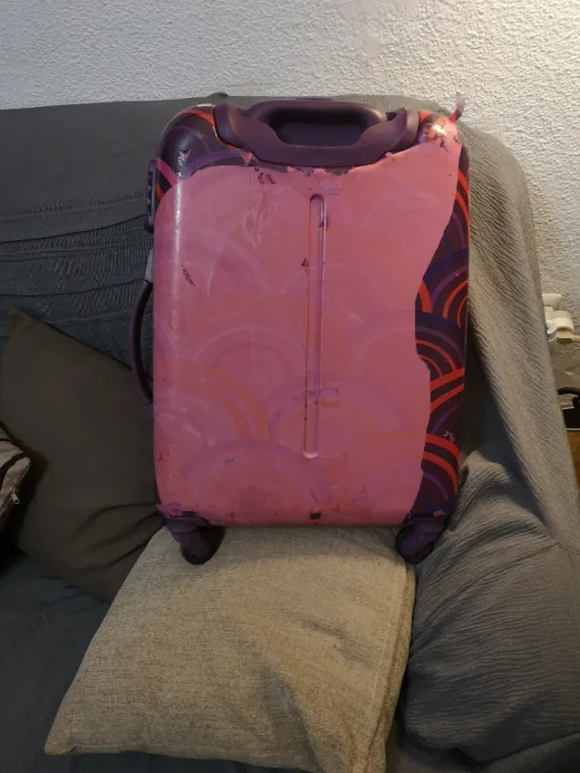 Maleta pequeña con diseño de círculos