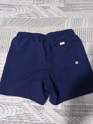 Confezione da 2 costumi da bagno per bambini di Olaian (Decathlon) e Thent (Décimas)