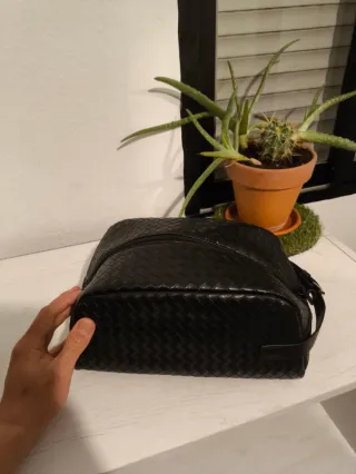 Bolso de mano hombre negro tejido