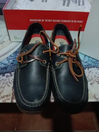 Náuticos de piel azul marino