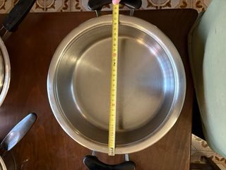 Set di 7 pentole metalliche con coperchi AMC