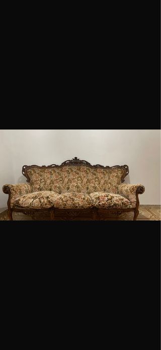 Divano vintage in legno e tessuto floreale