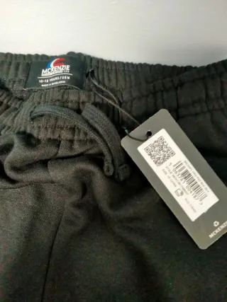 Pantalón chándal McKenzie. T. 11-12. Con etiqueta
