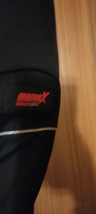 Chaqueta motera negra y gris /solo me queda una