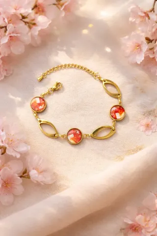 Bracciale dorato con inserti rossi giapponesi