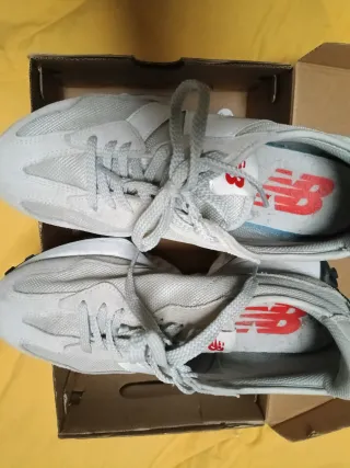 Zapatillas New Balance Gris y Blanco