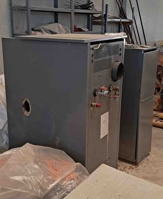 Caldera para calefacción de agua de pellenc Domusa