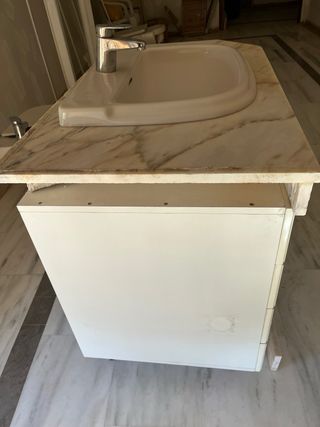 Mueble de baño con lavabo de mármol