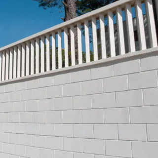 Muros. Bloques de hormigón. Ladrillos. Enfoscados.