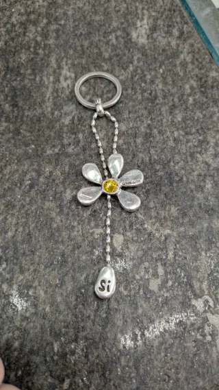 Portachiavi Unode50 fiore con strass giallo