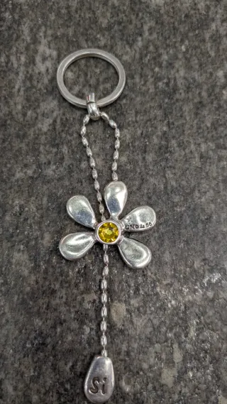 Portachiavi Unode50 fiore con strass giallo