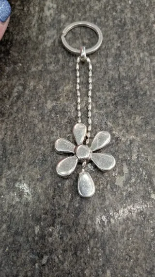 Portachiavi Unode50 fiore con strass giallo