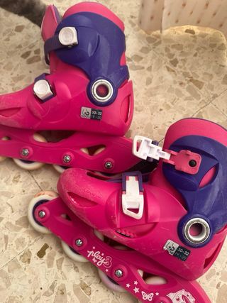 Patines infantiles Oxelo rosas y morados
