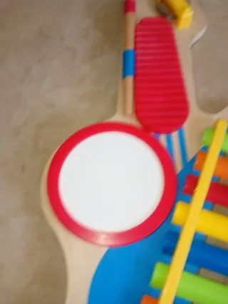 Guitarra madera 6 en 1 para bebé