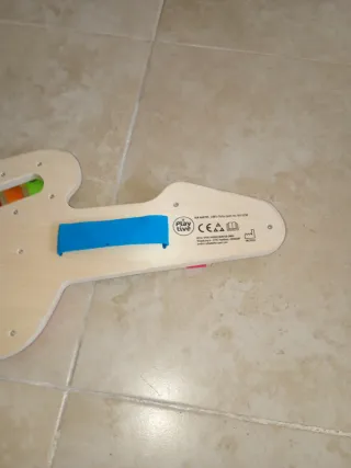 Guitarra madera 6 en 1 para bebé