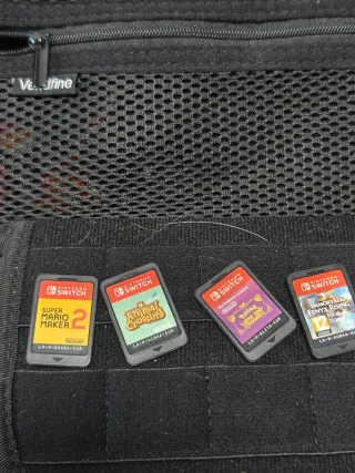 Nintendo Switch con juegos y funda