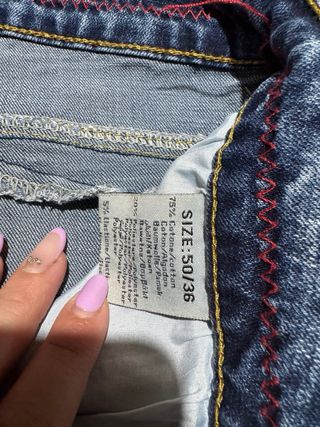 Jeans uomo strappati blu